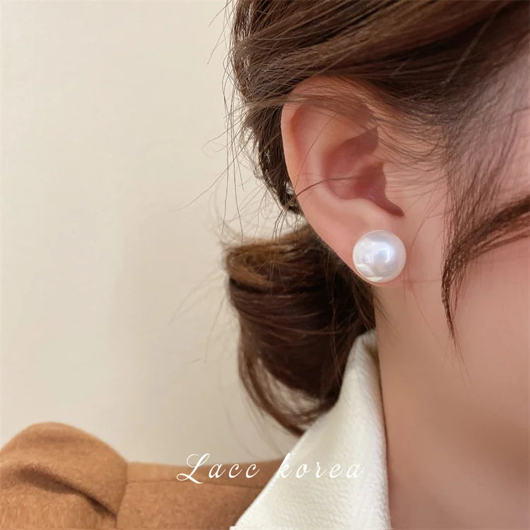 South Korea's newly designed fashion jewelry simple highlight pearl oblate earrings elegant women's daily work accessories