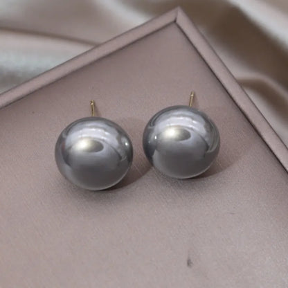 South Korea's newly designed fashion jewelry simple highlight pearl oblate earrings elegant women's daily work accessories